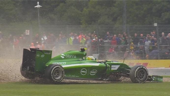 As the track starts to dry many teams switch to slick tyres. The change doesn't work for Caterham's Marcus Ericsson who spins at Becketts. © FOWC Ltd