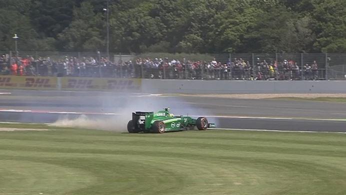Marcus Ericsson slides his Caterham off the track at Becketts. Despite keeping his engine running, the car gets beached, ending his morning. © FOWC Ltd