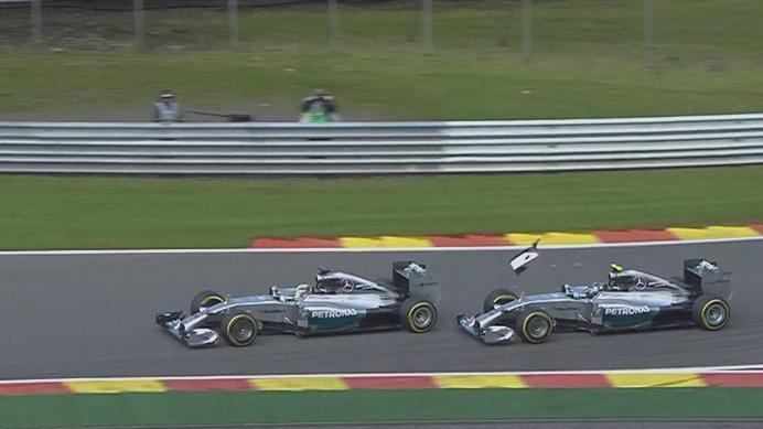 Mercedes' Lewis Hamilton and Nico Rosberg collide at Les Combes while fighting for the lead. Rosberg (right) loses his front wing endplate, while Hamilton suffers a puncture and has to limp back to the pits, dropping to 19th. © FOWC Ltd.