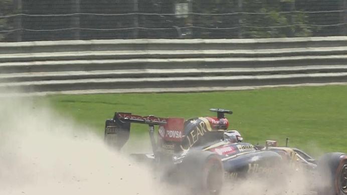Another off-track moment for the unruly Lotus E22, as Romain Grosjean skips across the gravel at the first Lesmo. © FOWC Ltd