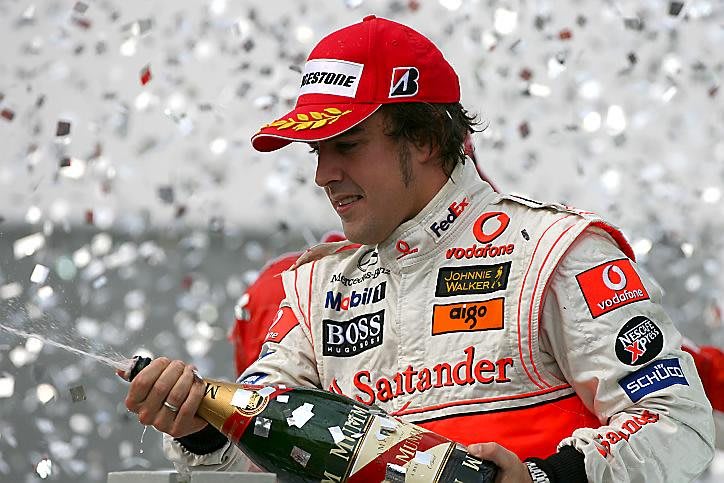 Fernando Alonso (ESP) McLaren Mercedes celebrates on the podium Formula One World Championship, Rd17, Brazilian Grand Prix, Race Day, Interlagos, Sao Paulo, Brazil, Sunday, 21 October 2007. © Sutton Images