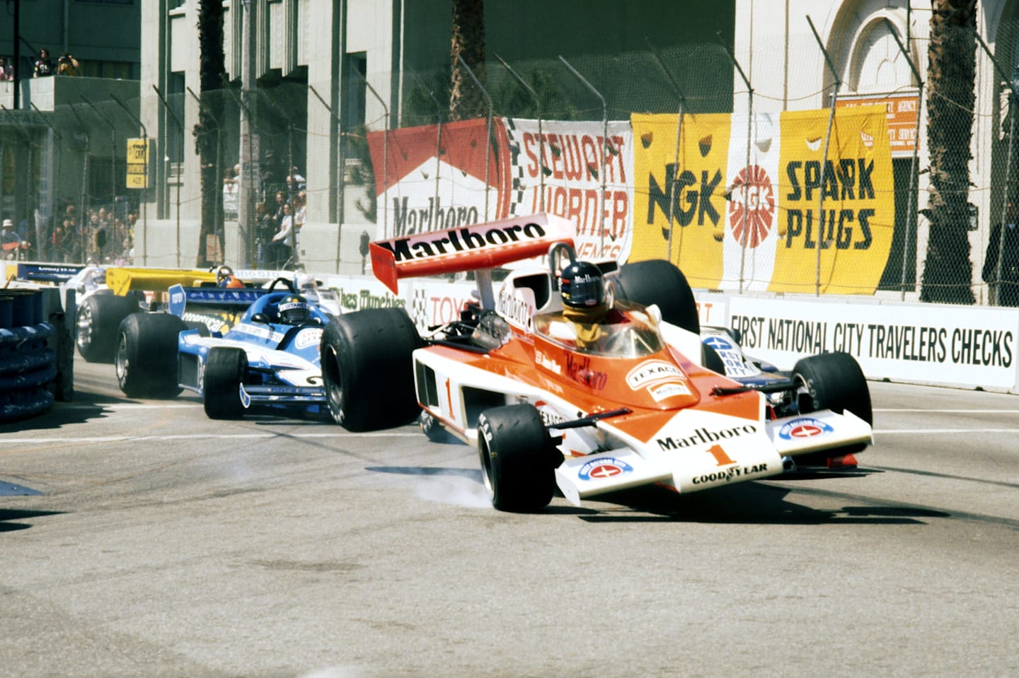 James Hunt's McLaren is launched into the air at the first corner after contact with John Watson's Brabham. United States Grand Prix West, Rd 4, Long Beach, USA, 3 April 1977. © Sutton Images. No reproduction without permission