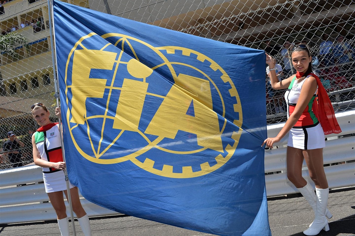 Girls on the grid with an FIA flag. Formula One World Championship, Rd6, Monaco Grand Prix, Race Day, Monte-Carlo, Monaco, Sunday, 26 May 2013. © Sutton Images