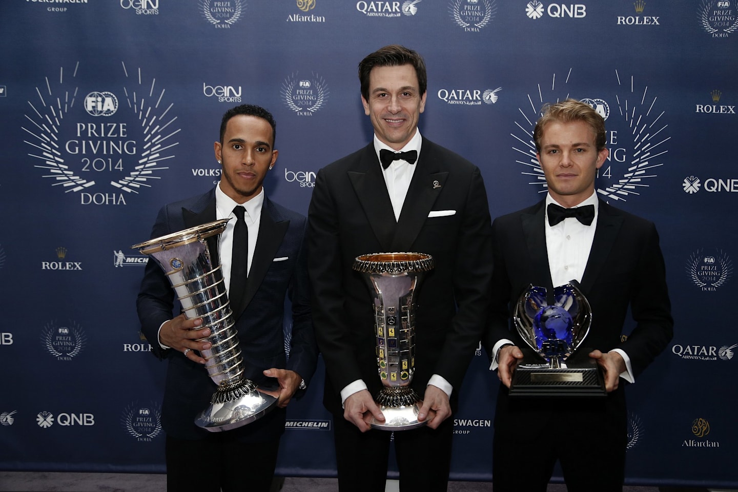 (L to R) Mercedes' Lewis Hamilton, Toto Wolff and Nico Rosberg during the FIA Prize Giving 2014 on December 5th 2014, at Doha, Qatar. © Jean Michel Le Meur / DPPI