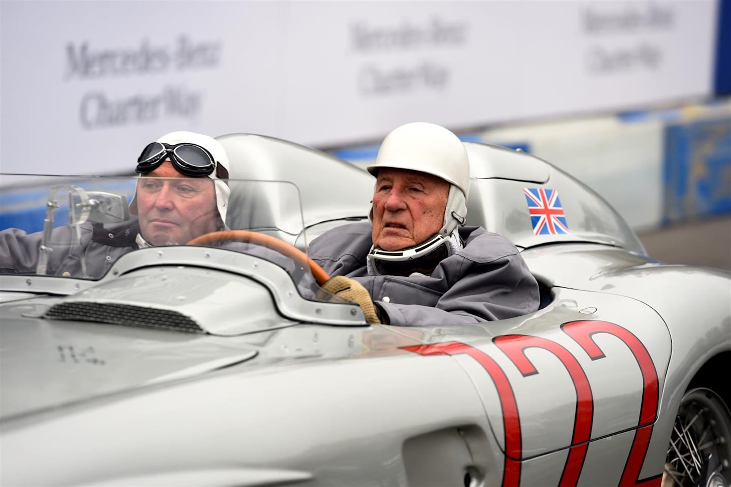 Sir Stirling Moss (GBR) and Jochen Mass (GER). Mercedes-Benz Stars and Cars, Mercedes-Benz Museum, Stuttgart, Germany, 29 November 2014. © Sutton Images