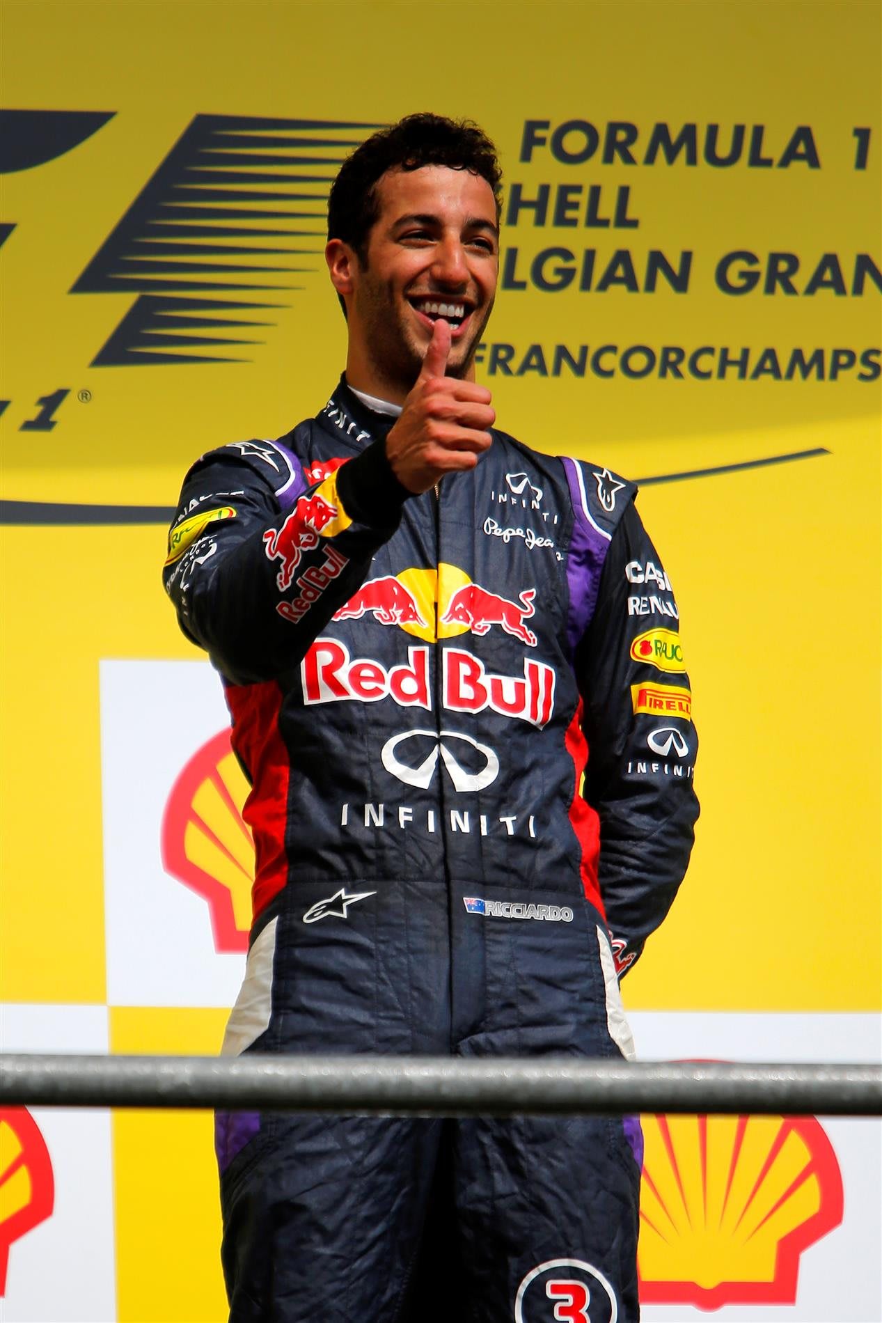 Race winner Daniel Ricciardo (AUS) Red Bull Racing on the podium. Formula One World Championship, Rd12, Belgian Grand Prix, Race Day, Spa-Francorchamps, Belgium, Sunday, 24 August 2014. © Sutton Images