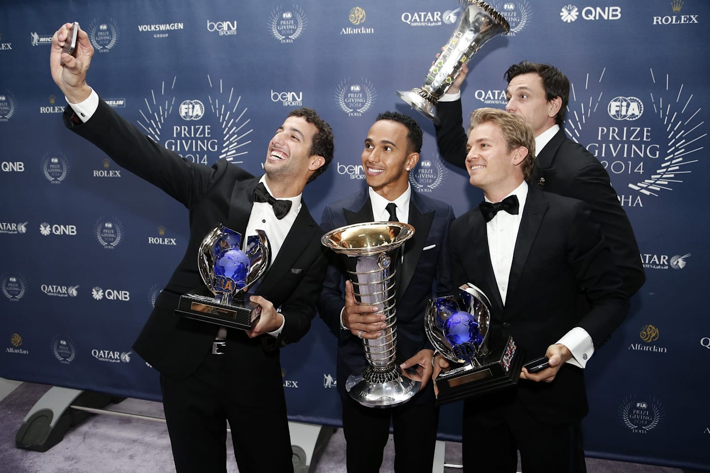 (L to R) Red Bull's Daniel Ricciardo, Mercedes' Lewis Hamilton, Nico Rosberg and Toto Wolff during the FIA Prize Giving 2014 on December 5th 2014, at Doha, Qatar. © Jean Michel Le Meur / DPPI