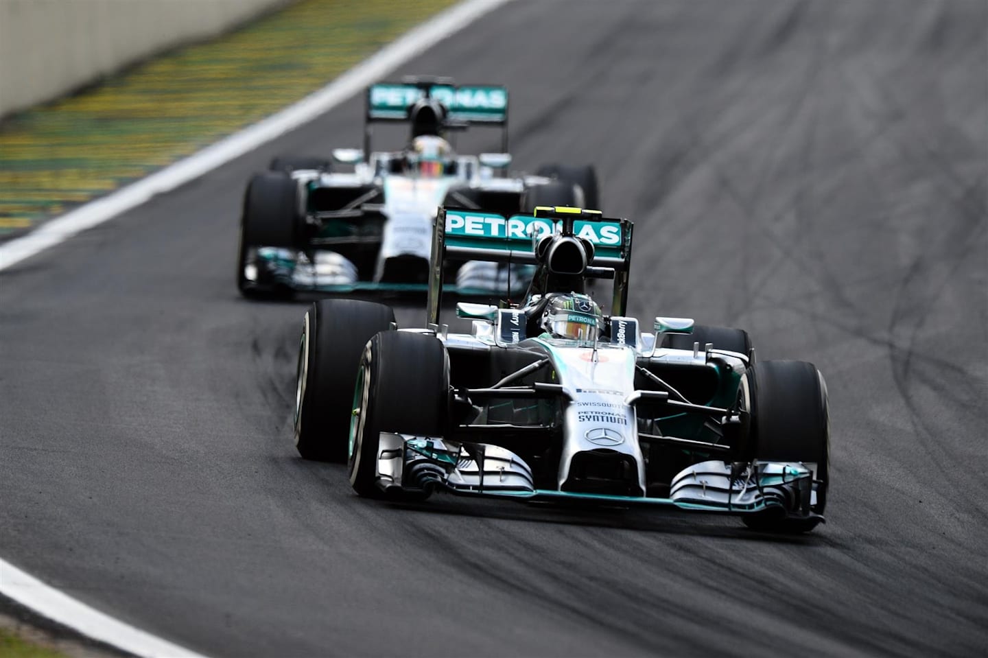 Nico Rosberg (GER) Mercedes AMG F1 W05 leads Lewis Hamilton (GBR) Mercedes AMG F1 W05. Formula One World Championship, Rd18, Brazilian Grand Prix, Race, Sao Paulo, Brazil, Sunday, 9 November 2014