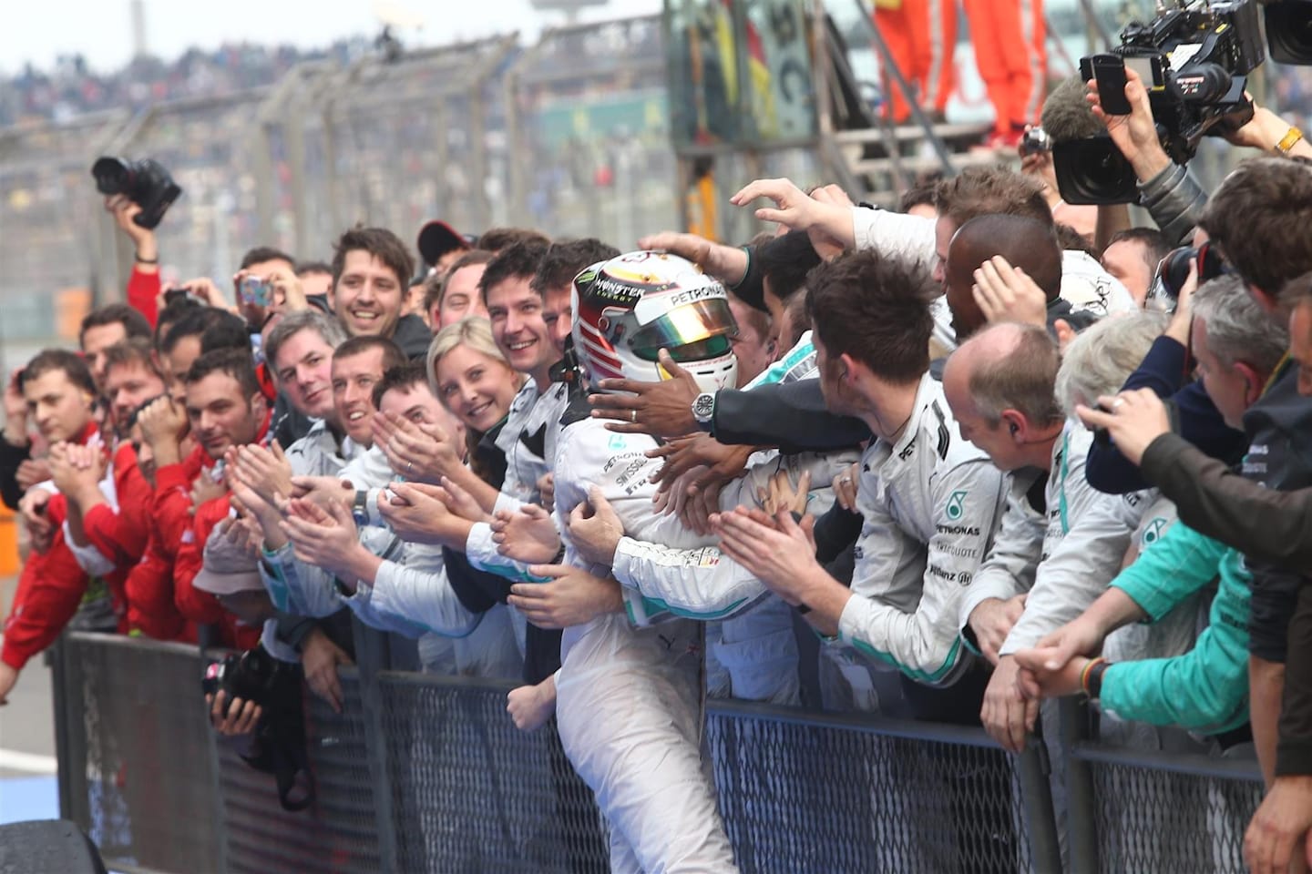 Race winner Lewis Hamilton (GBR) Mercedes AMG F1 celebrates with his team in parc ferme. Formula One World Championship, Rd4, Chinese Grand Prix, Race, Shanghai, China, Sunday, 20 April 2014