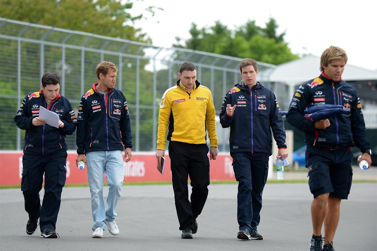 Sebastian Vettel (GER) Red Bull Racing walks the track with Tim Malyon (GBR) Red Bull Racing Performance Engineer. Formula One World Championship, Rd7, Canadian Grand Prix, Preparations, Montreal, Canada, Thursday, 5 June 2014