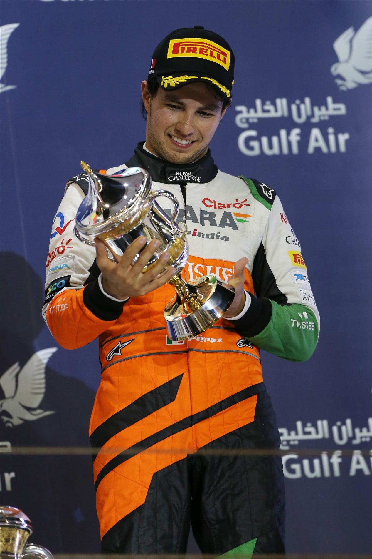 Sergio Perez (MEX) Force India celebrates on the podium. Formula One World Championship, Rd3, Bahrain Grand Prix, Race, Bahrain International Circuit, Sakhir, Bahrain, Sunday, 6 April 2014