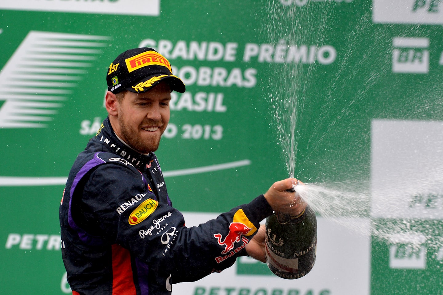 Race winner Sebastian Vettel (GER) Red Bull Racing celebrates on the podium with the champagne.
Formula One World Championship, Rd19, Brazilian Grand Prix, Race, Sao Paulo, Brazil, Sunday 24 November 2013.