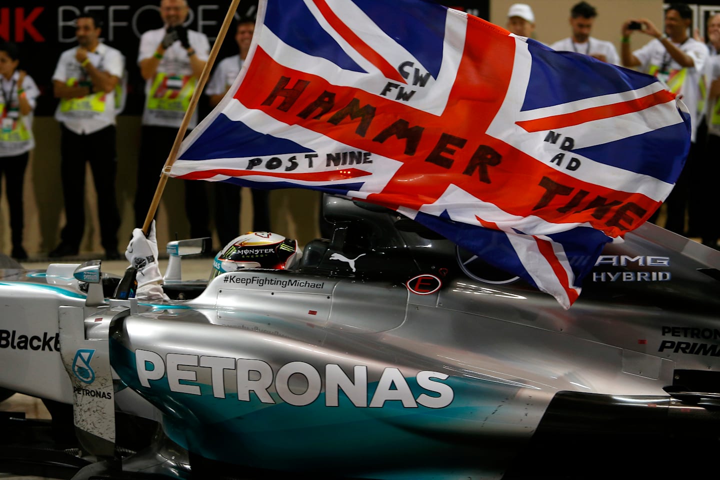 Lewis Hamilton (GBR) Mercedes AMG F1 W05 arrives in parc ferme. Formula One World Championship, Rd19, Abu Dhabi Grand Prix, Race, Yas Marina Circuit, Abu Dhabi, UAE, Sunday, 23 November 2014