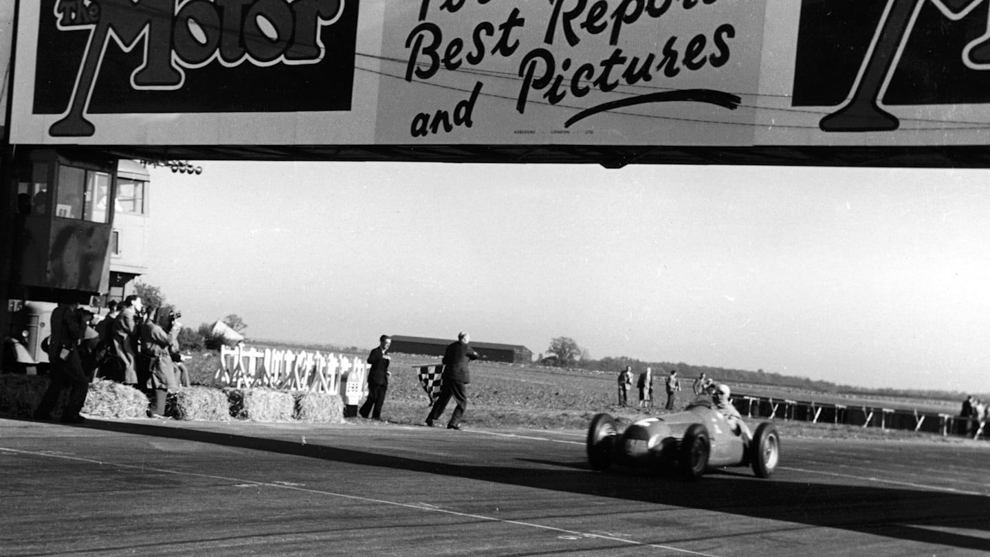 Giuseppe Farina (Alfa Romeo 158) 1st position, wins the first World Championship Grand Prix. 1950 British Grand Prix, Silverstone.
© LAT Photographic