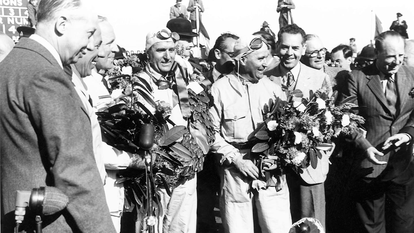 Giuseppe Farina and Luigi Fagioli on the podium. 1950 British Grand Prix
Silverstone, Great Britain. 13th May 1950.
World Copyright: LAT Photographic