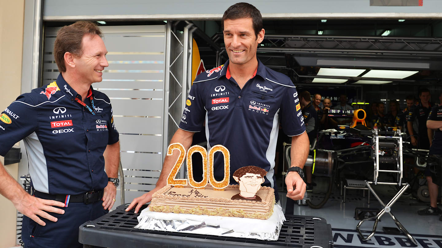 Mark Webber (AUS) Red Bull Racing celebrates his 200th Grand Prix start with Christian Horner (GBR)