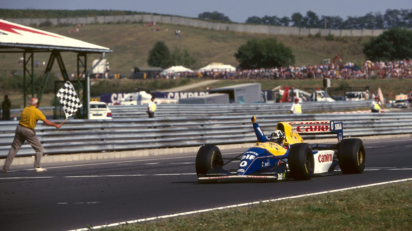 Damon Hill (GBR), Williams Renault FW15C, celebrates his debut Grand Prix win. Hungarian Grand