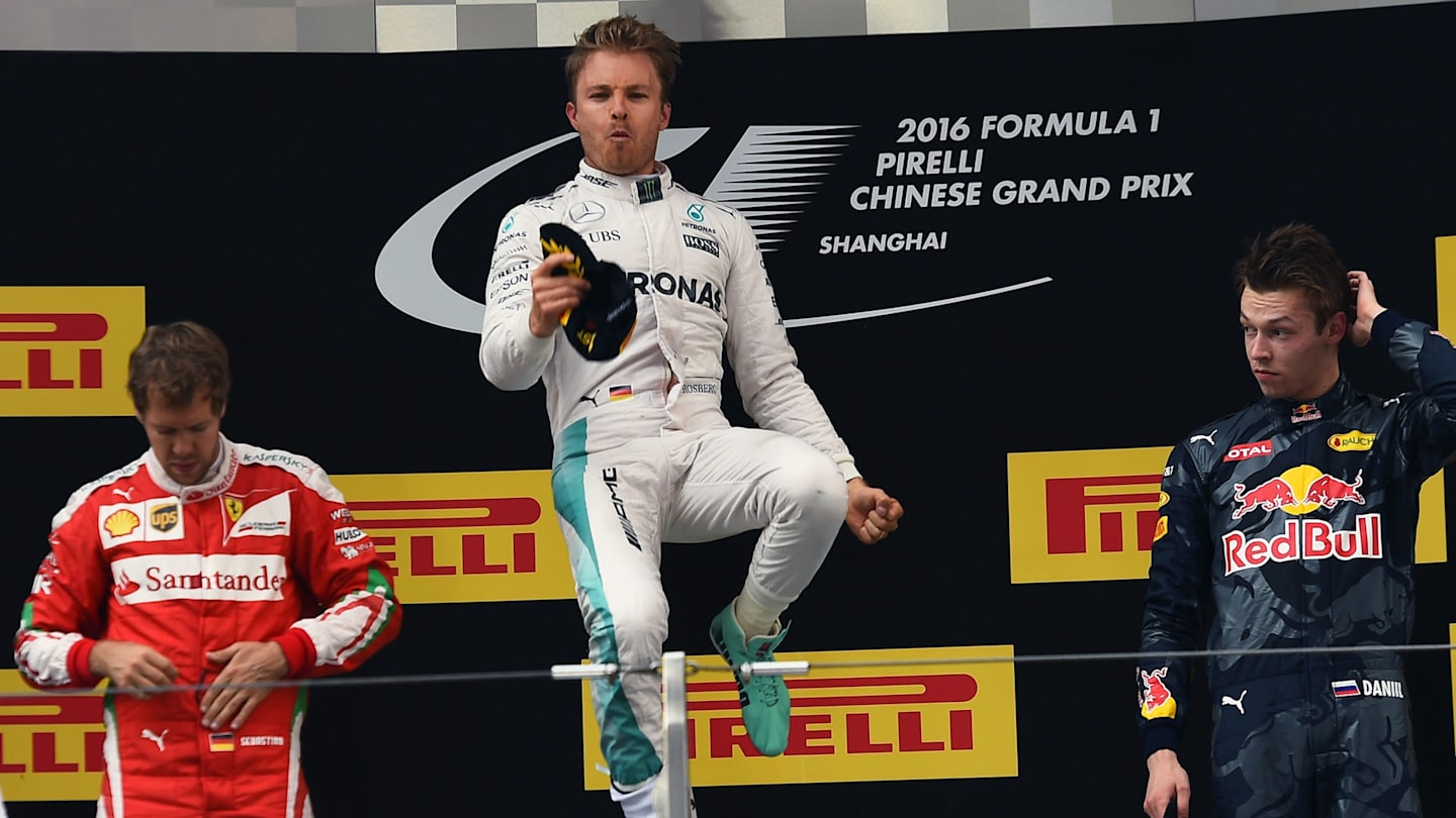 www.sutton-images.com  Sebastian Vettel (GER) Ferrari, race winner Nico Rosberg (GER) Mercedes