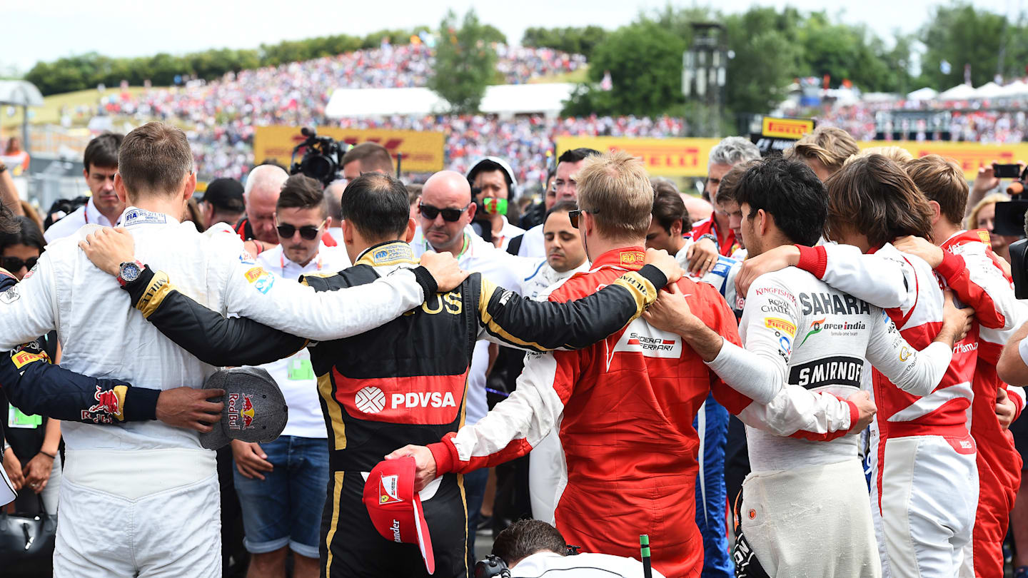 Respects are paid to Jules Bianchi on the grid at Formula One World Championship, Rd10, Hungarian