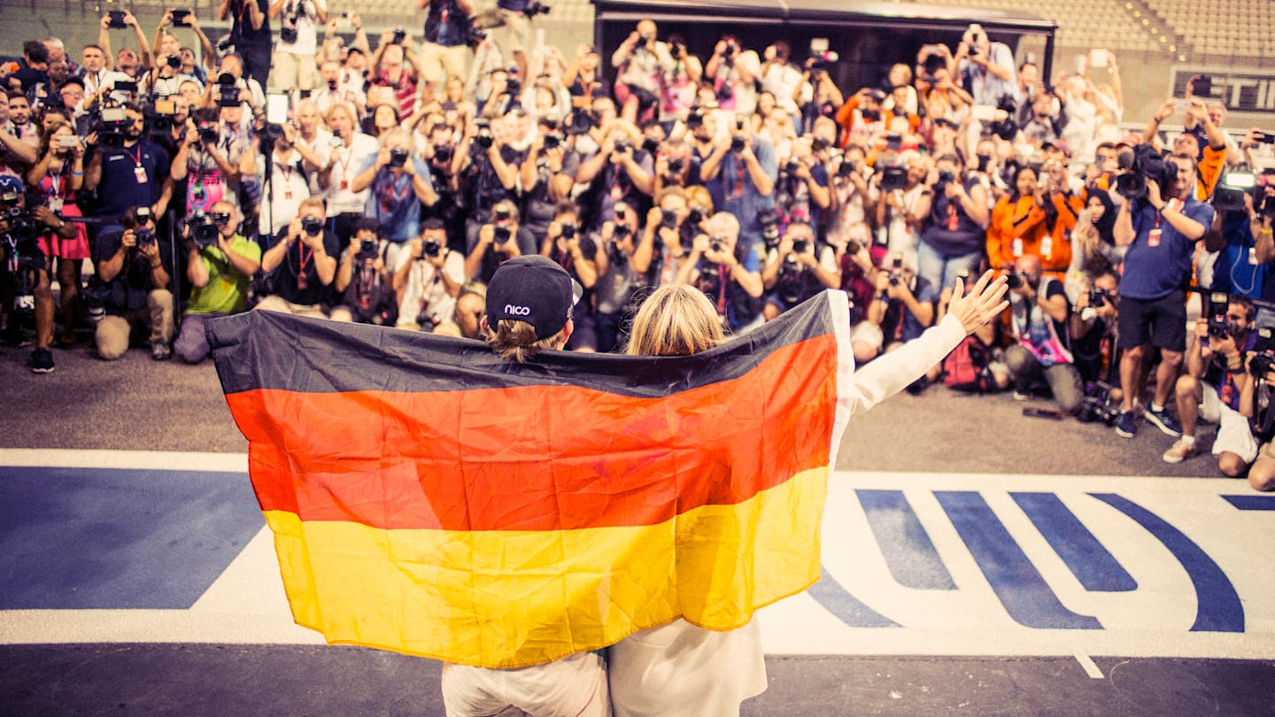 Celebrating with wife Vivian ©  Mercedes-Benz Grand Prix Ltd / Paul Ripke