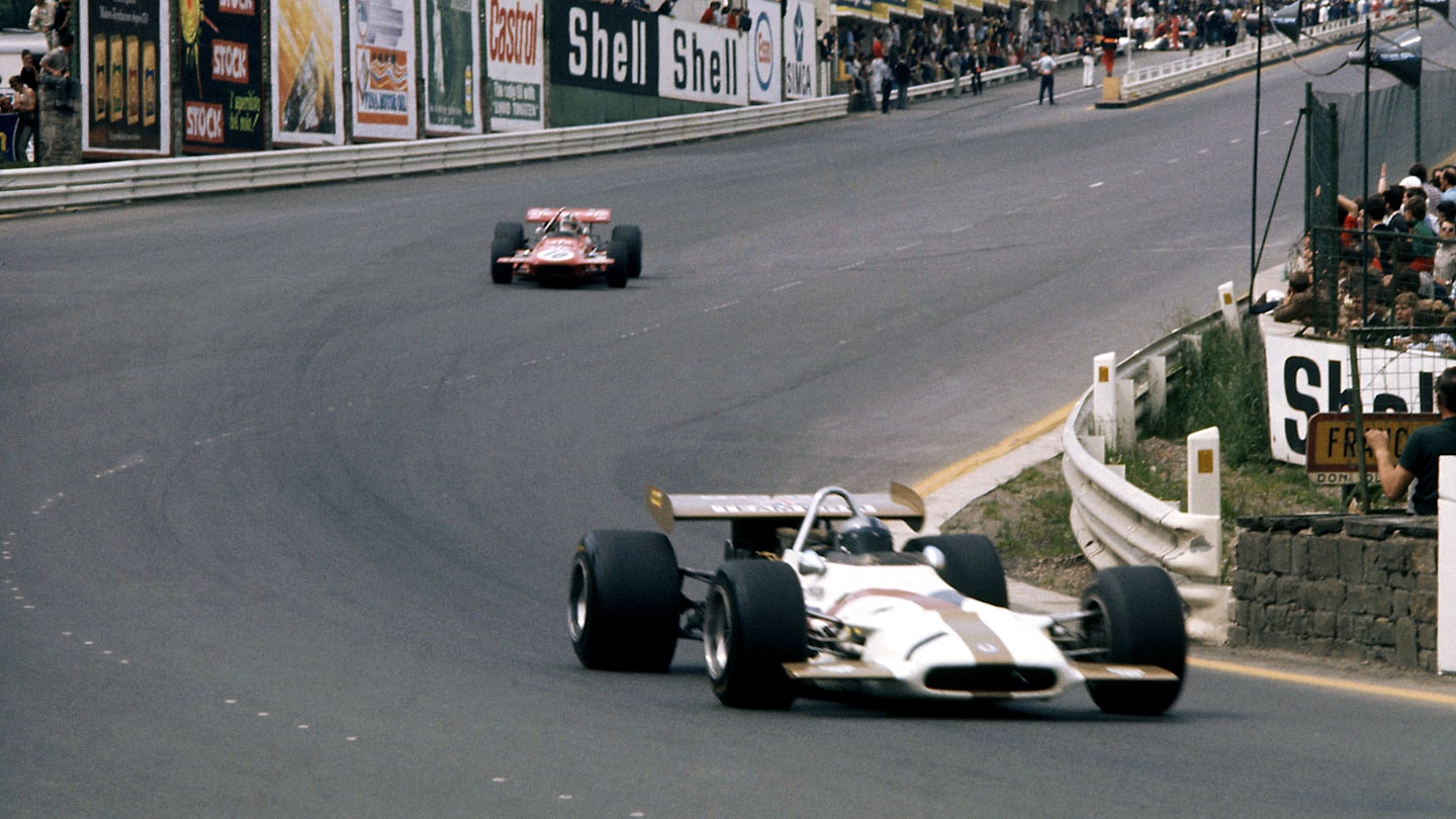 Pedro Rodriguez (BRM P153) leads Chris Amon (March 701) into Eau Rouge. 
Spa-Francorchamps, Belgium. 5-7 June 1970. © LAT Photographic 