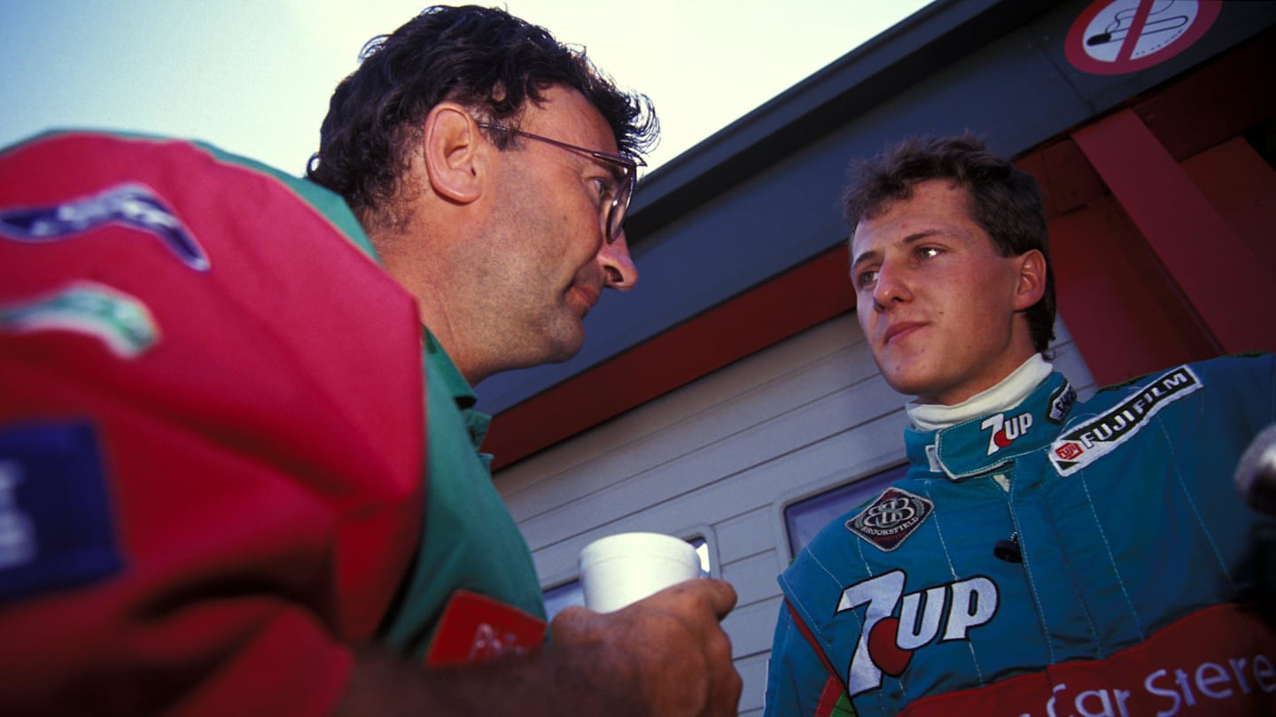 Michael Schumacher (GER) Jordan talks with Eddie Jordan (IRL) Jordan Team owner. 

Formula One World Championship. Belgium Grand Prix, Spa, Belgium. 25 August 1991. © Sutton Motorsport Images