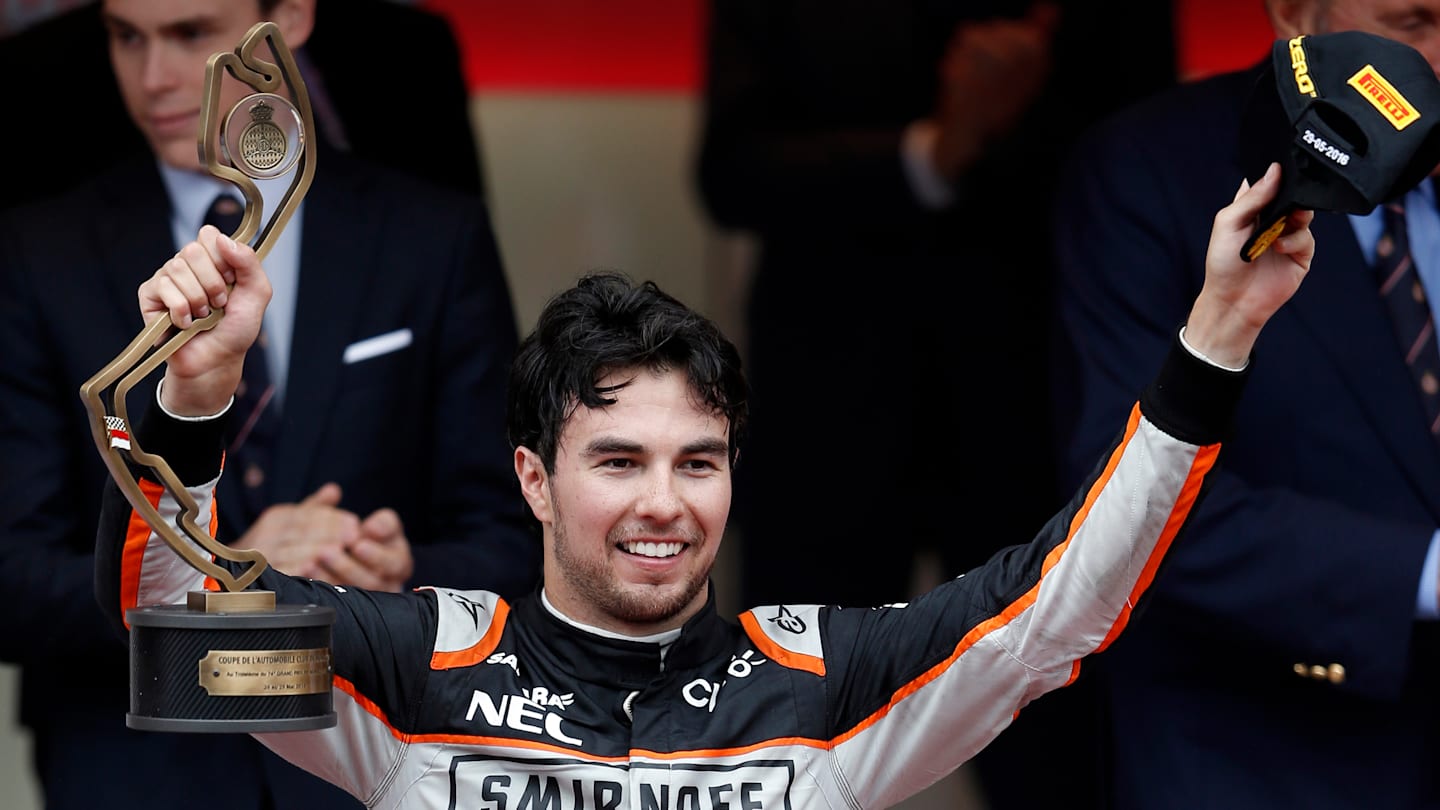 www.sutton-images.com  Sergio Perez (MEX) Force India celebrates on the podium with the trophy on