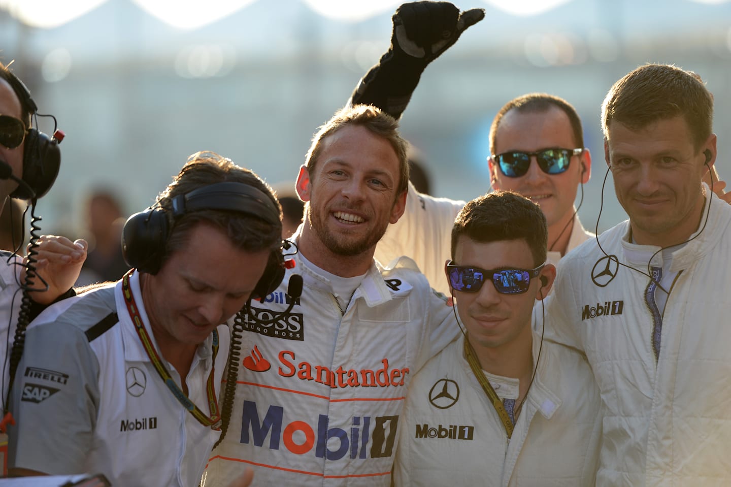 Jenson Button (GBR) McLaren and mechanics on the grid. Formula One World Championship, Rd19, Abu Dhabi Grand Prix, Race, Yas Marina Circuit, Abu Dhabi, UAE, Sunday, 23 November 2014 