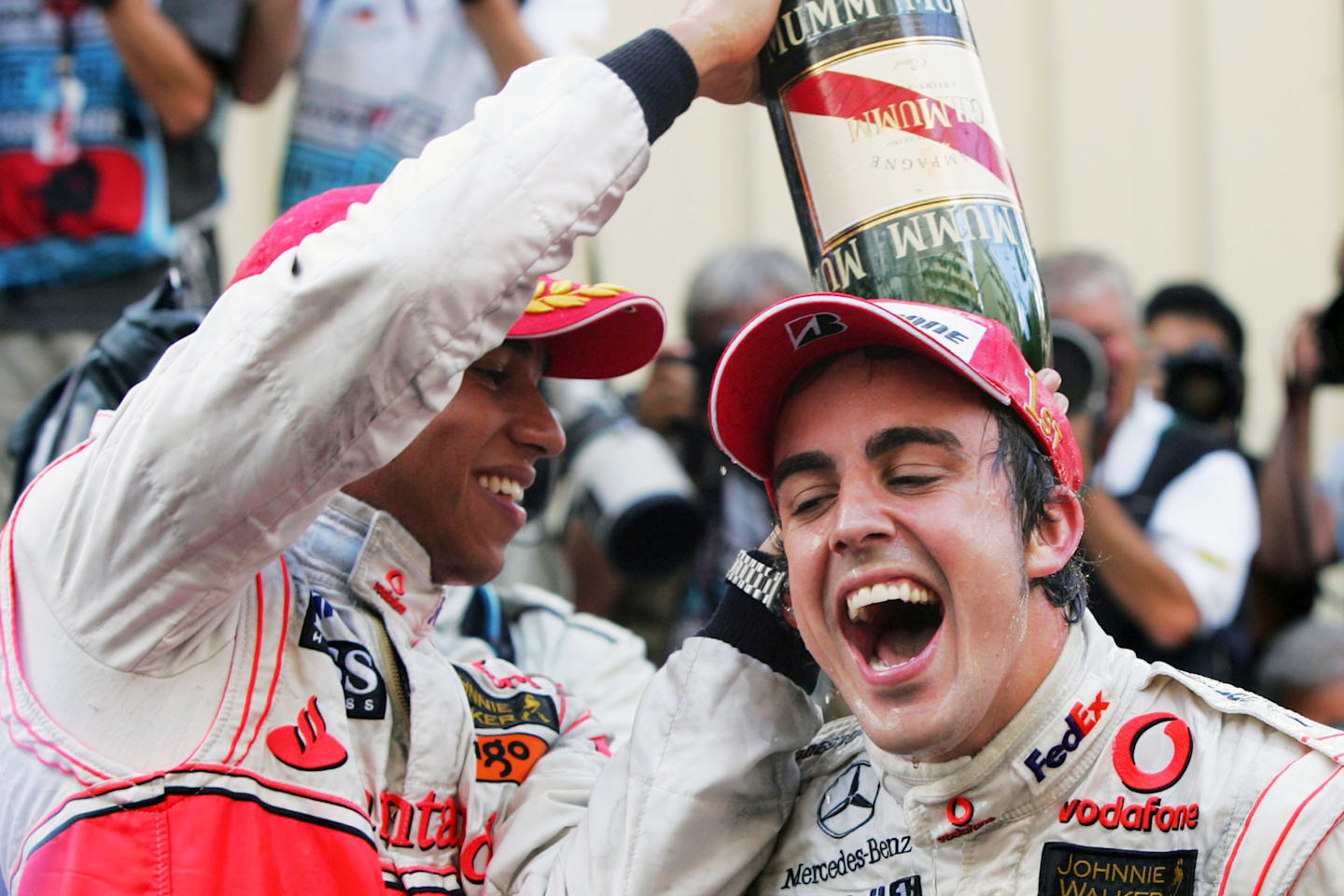 Second place finisher Lewis Hamilton (GBR) Mclaren and race winner Fernando Alonso (ESP) McLaren