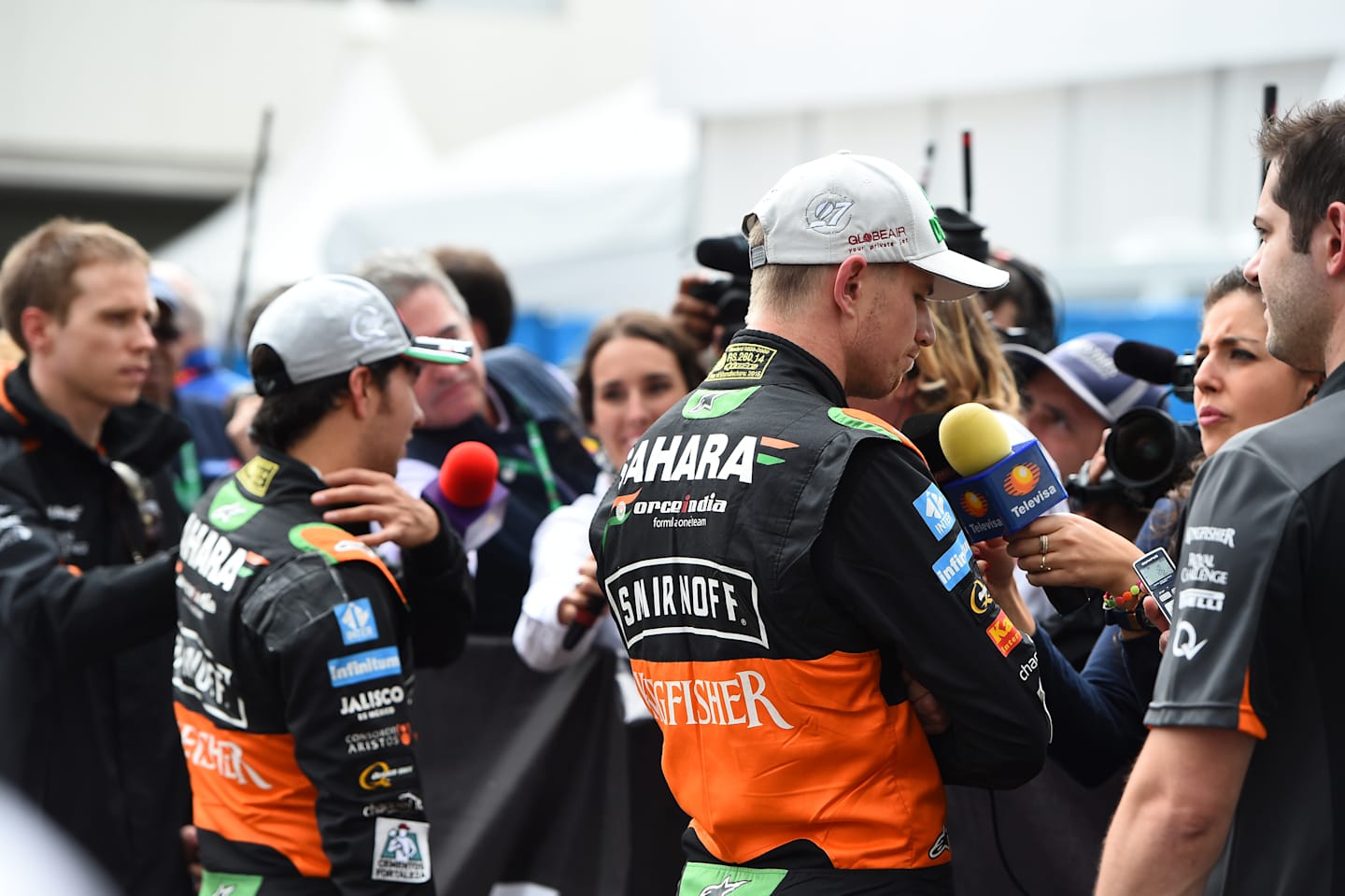 Sergio Perez (MEX) Force India and Nico Hulkenberg (GER) Force India F1 talk to the press at