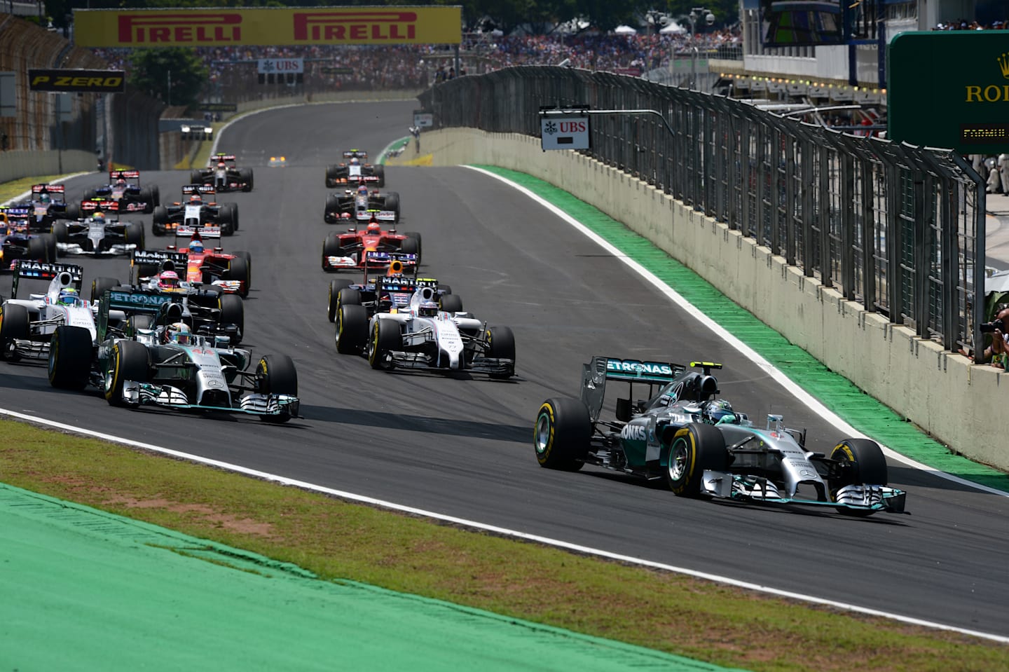 Nico Rosberg (GER) Mercedes AMG F1 W05 leads Lewis Hamilton (GBR) Mercedes AMG F1 W05 at the start of the race. Formula One World Championship, Rd18, Brazilian Grand Prix, Race, Sao Paulo, Brazil, Sunday 9 November 2014. © Sutton Motorsport Images