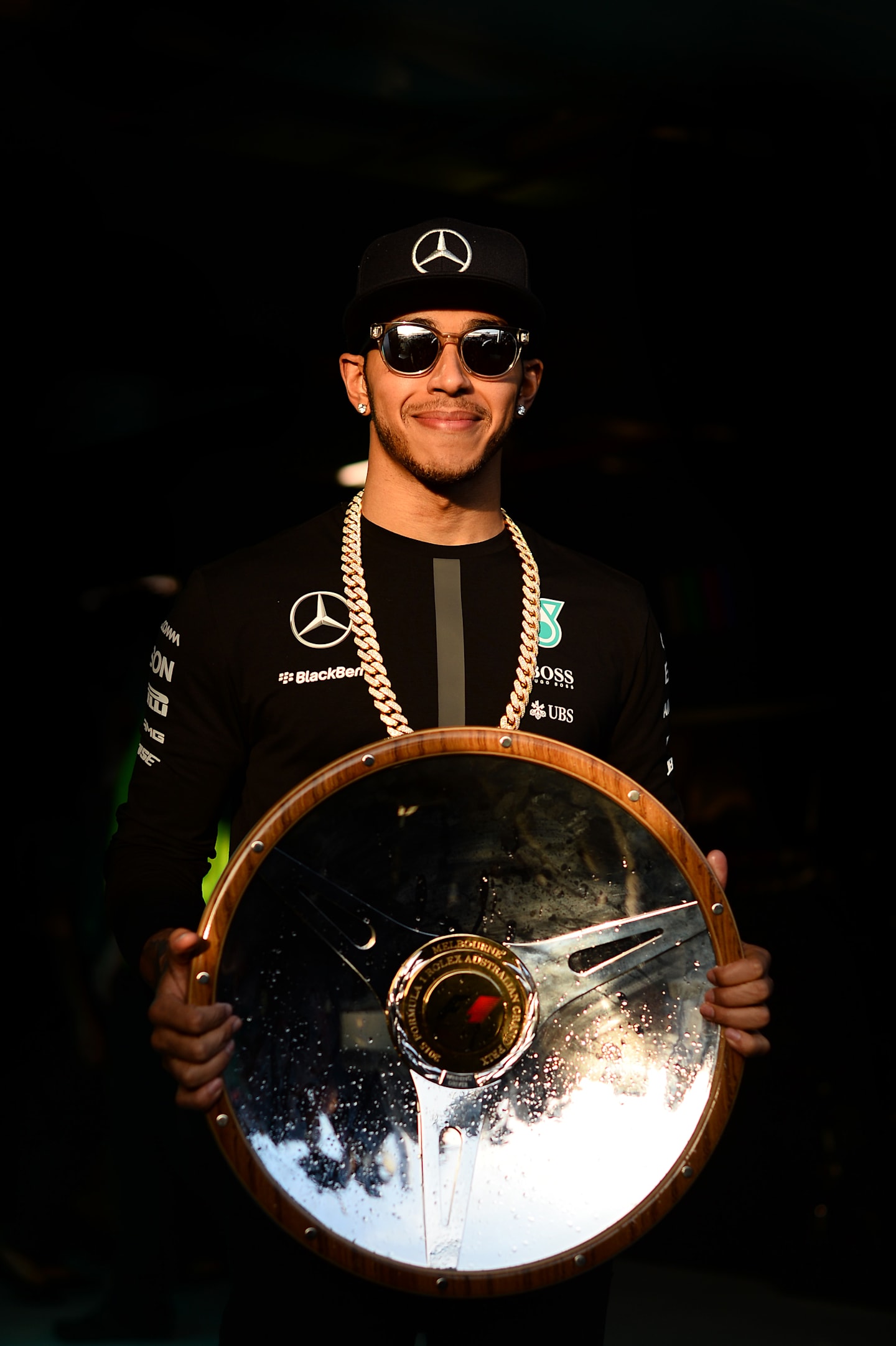 Lewis Hamilton (GBR) Mercedes AMG F1 with his trophy at Formula One World Championship, Rd1,