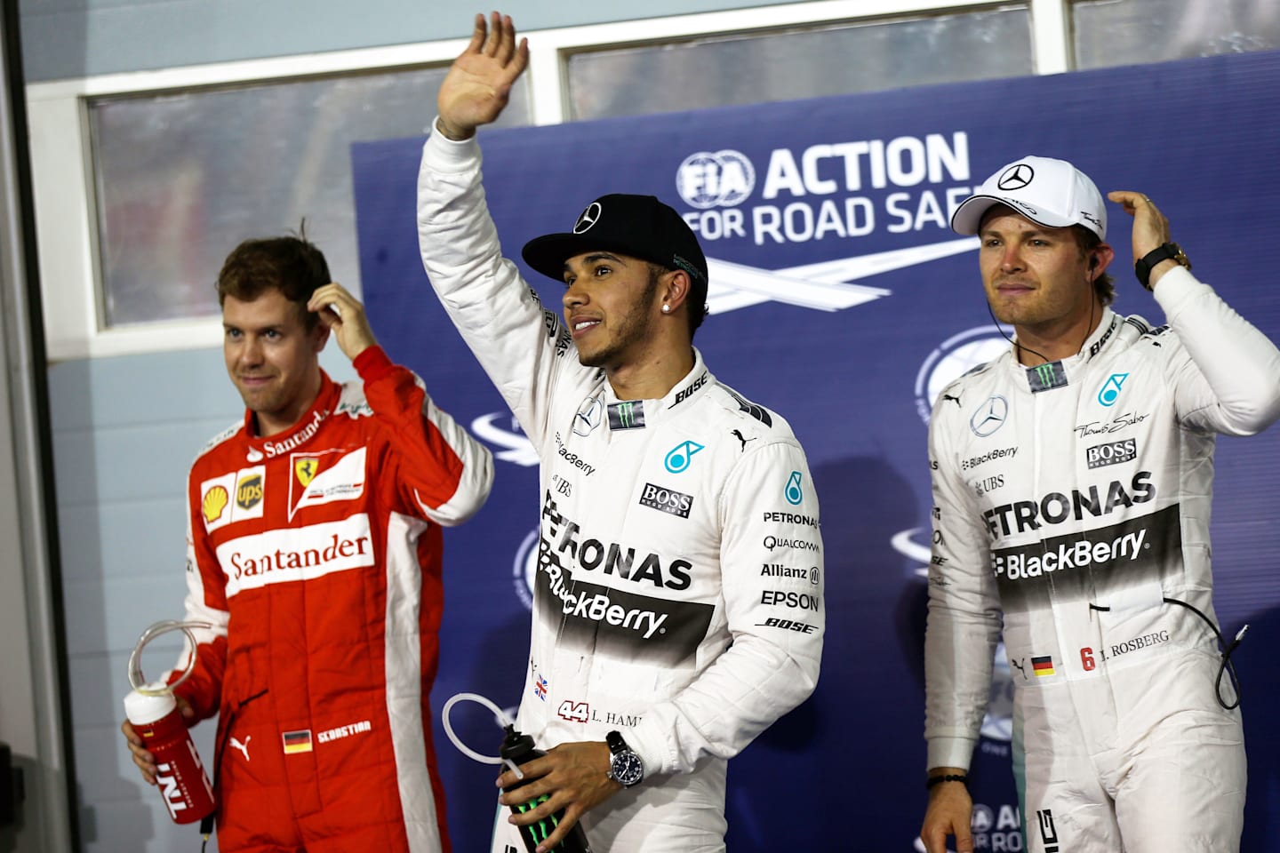(L to R): Sebastian Vettel (GER) Ferrari, pole sitter Lewis Hamilton (GBR) Mercedes AMG F1 and Nico