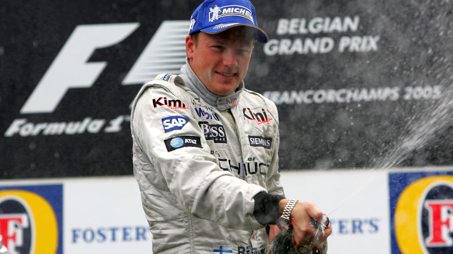 Race winner Kimi Raikkonen (FIN) McLaren sprays the champagne on the podium.  Formula One World