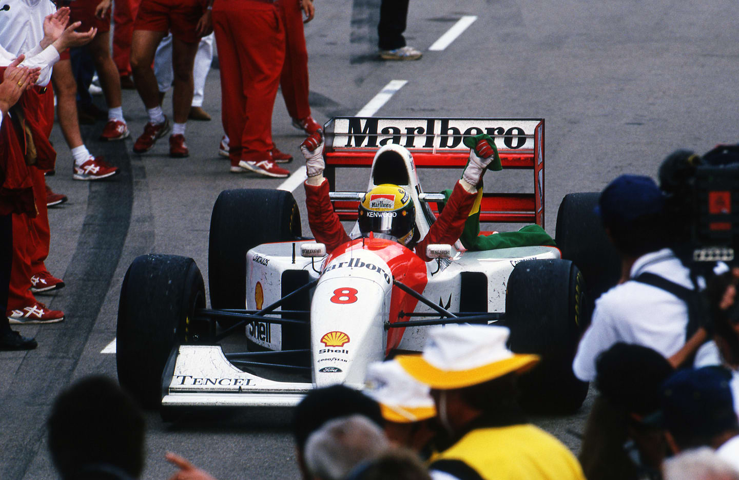 Ayrton Senna (BRA) McLaren MP4/8 celebrates his victory. Fromula One World Championship, Rd16,
