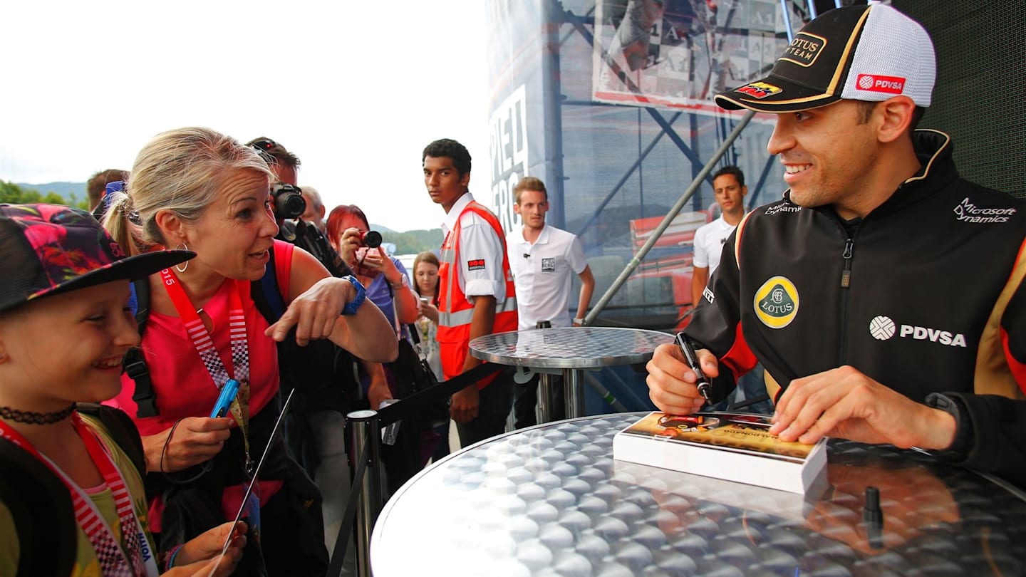 Pastor Maldonado (VEN) Lotus signs autographs for the fans at Formula One World Championship, Rd8, Austrian Grand Prix, Preparations, Spielberg, Austria, Thursday 18 June 2015. © Sutton Motorsport Images