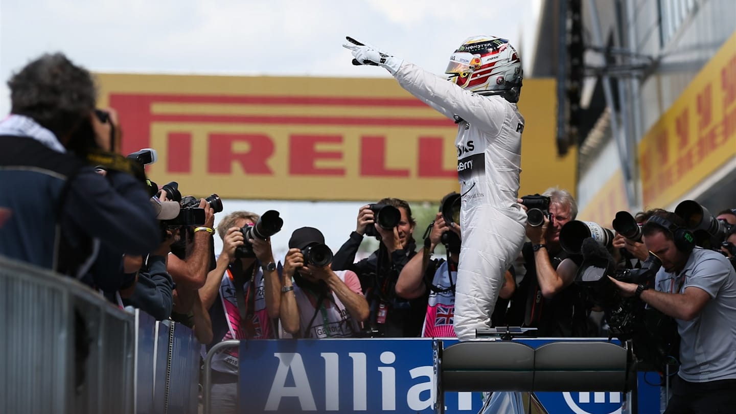 Pole sitter Lewis Hamilton (GBR) Mercedes AMG F1 celebrates in parc ferme at Formula One World Championship, Rd9, British Grand Prix, Qualifying, Silverstone, England, Saturday 4 July 2015. © Sutton Motorsport Images