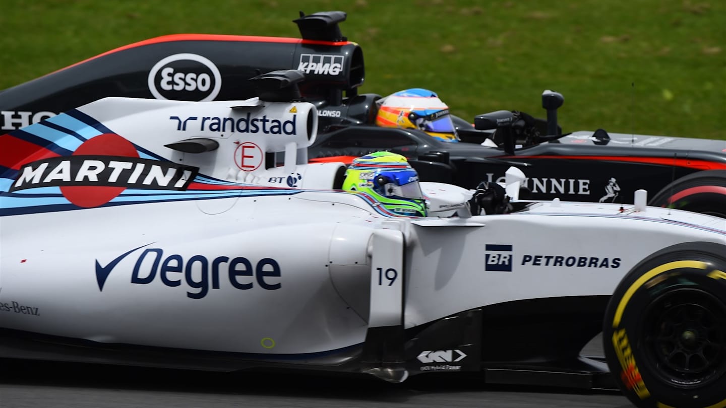 Felipe Massa (BRA) Williams FW37 and Fernando Alonso (ESP) McLaren MP4-30 battle at Formula One