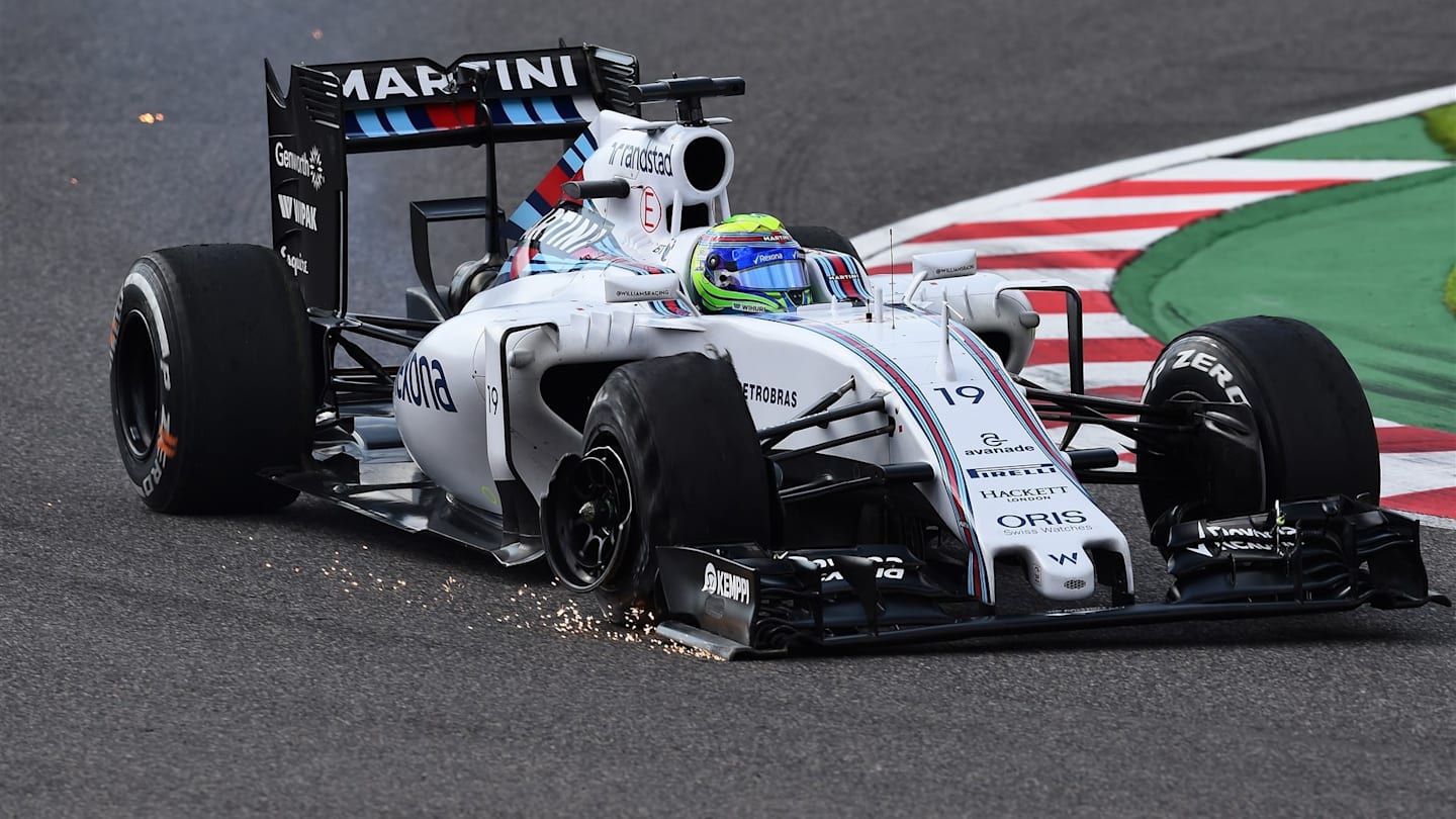 Felipe Massa (BRA) Williams FW37 with puncture on lap one at Formula One World Championship, Rd14, Japanese Grand Prix, Race, Suzuka, Japan, Sunday 27 September 2015. © Sutton Motorsport Images