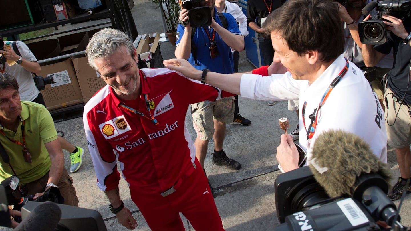 Toto Wolff (AUT) Mercedes AMG F1 Director of Motorsport congratulates Maurizio Arrivabene (ITA)