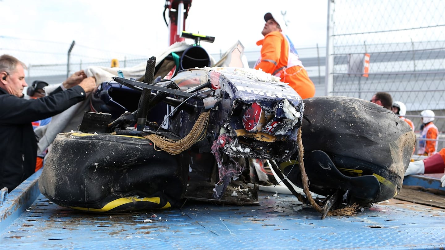The crashed car of Sainz jr (ESP) Scuderia Toro Rosso STR10 is recovered  in FP3 at Formula One