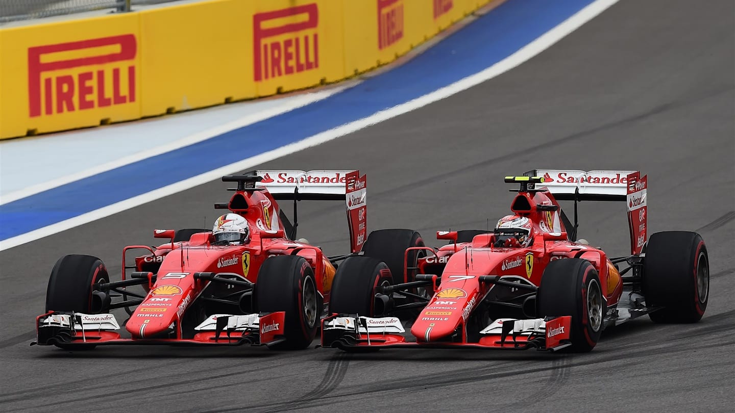 Sebastian Vettel (GER) Ferrari SF15-T and Kimi Raikkonen (FIN) Ferrari SF15-T battle at Formula One