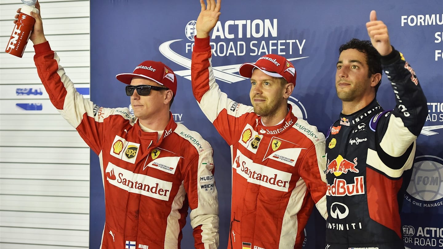 (L to R): Kimi Raikkonen (FIN) Ferrari, Sebastian Vettel (GER) Ferrari and Daniel Ricciardo (AUS)