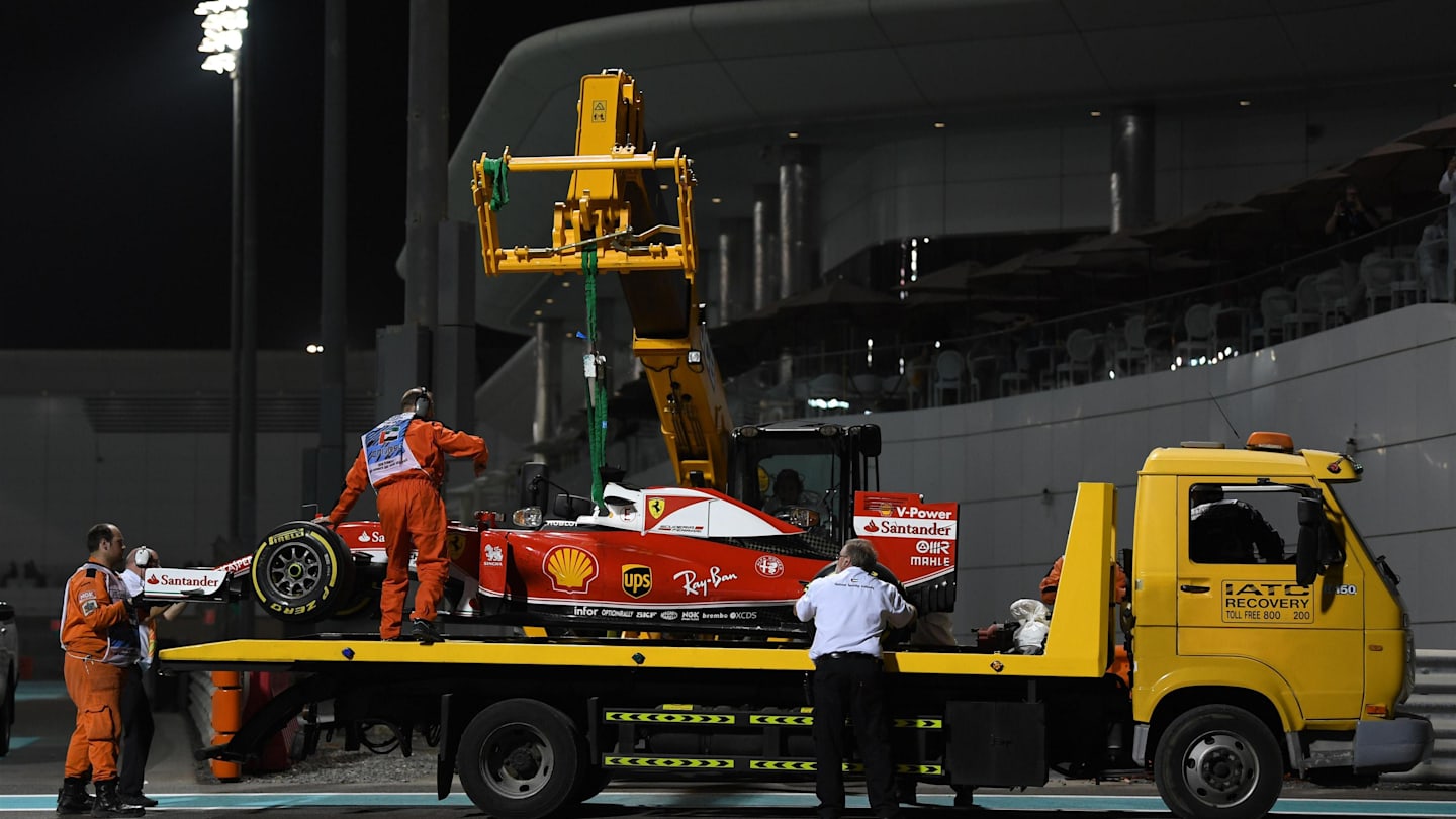 The car of Sebastian Vettel (GER) Ferrari SF16-H is recovered after stopping on track in FP2 at Formula One World Championship, Rd21, Abu Dhabi Grand Prix, Practice, Yas Marina Circuit, Abu Dhabi, UAE, Friday 25 November 2016. © Sutton Images