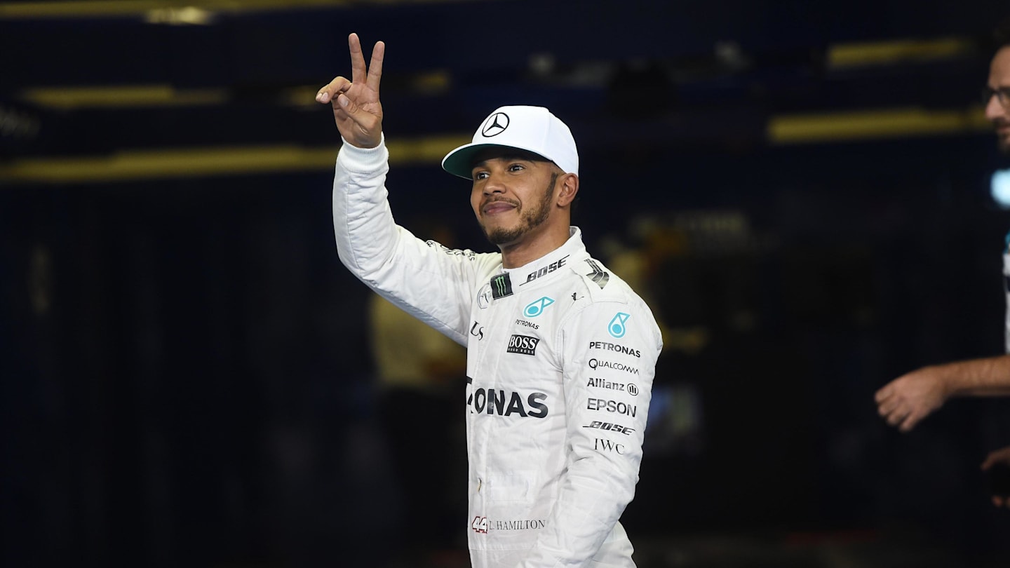 Pole sitter Lewis Hamilton (GBR) Mercedes AMG F1 celebrates in parc ferme at Formula One World Championship, Rd21, Abu Dhabi Grand Prix, Qualifying, Yas Marina Circuit, Abu Dhabi, UAE, Saturday 26 November 2016. © Sutton Images