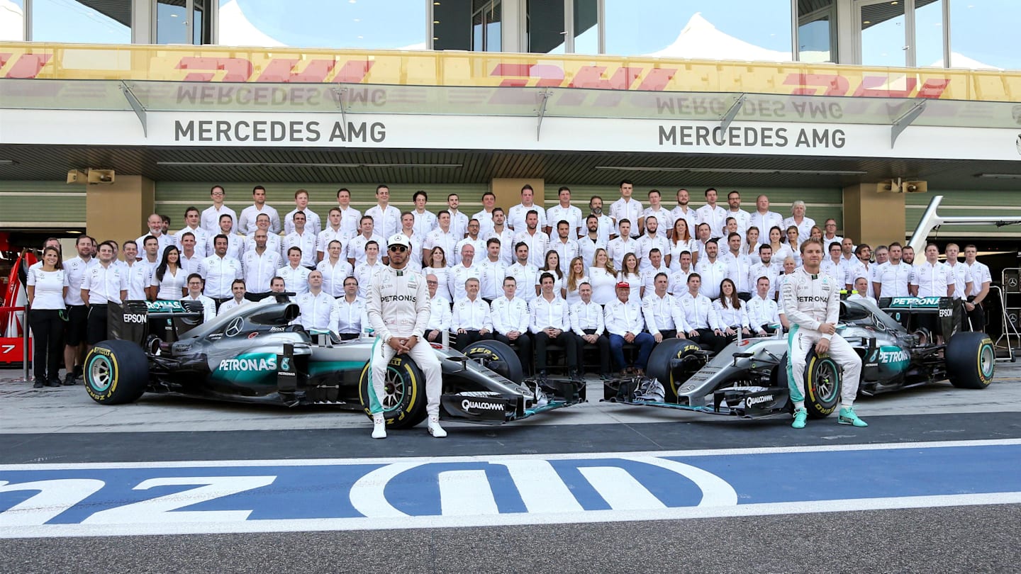 Lewis Hamilton (GBR) Mercedes AMG F1 and Nico Rosberg (GER) Mercedes AMG F1 in the team photo at Formula One World Championship, Rd21, Abu Dhabi Grand Prix, Race, Yas Marina Circuit, Abu Dhabi, UAE, Sunday 27 November 2016. © Sutton Images