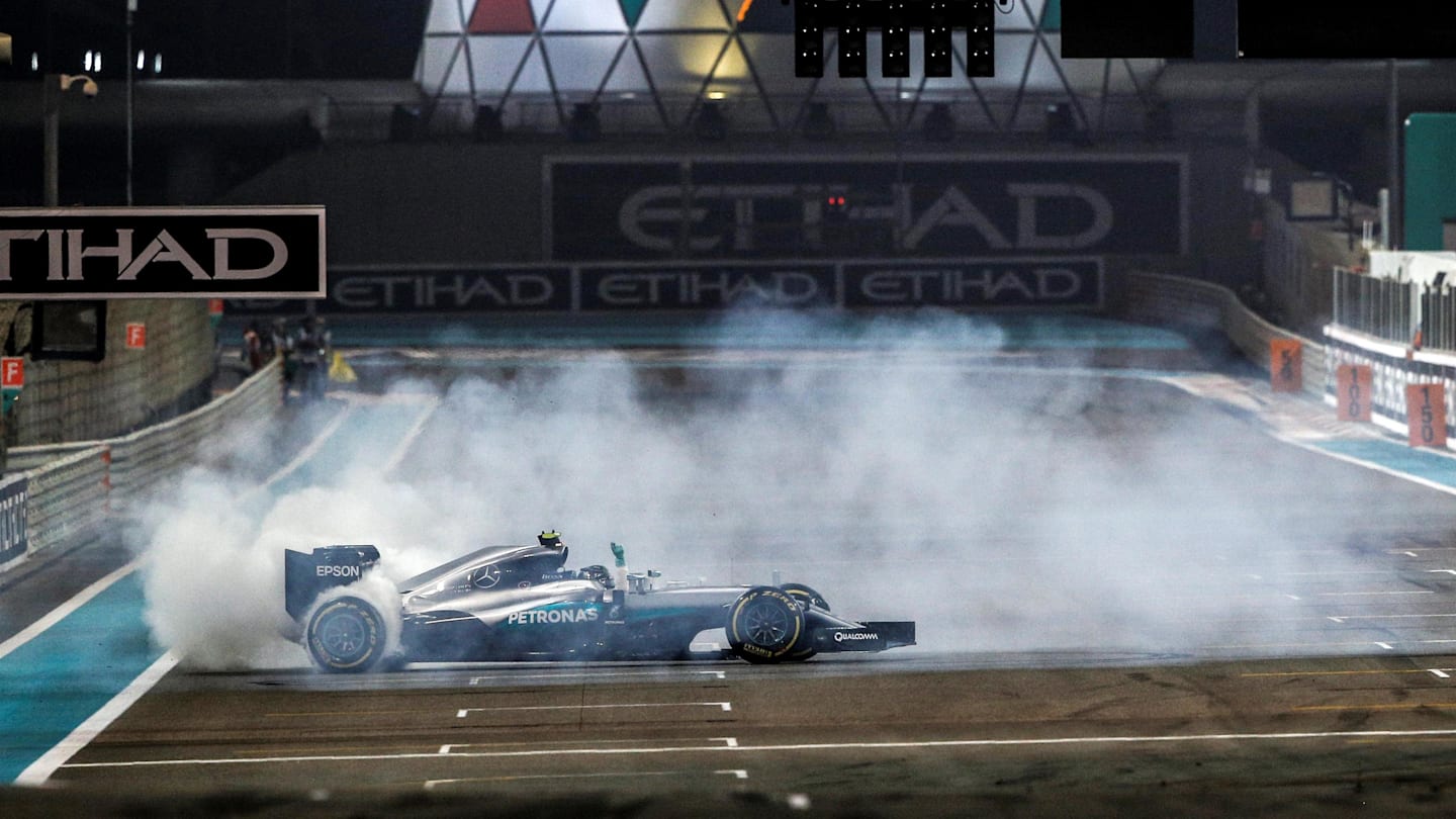 New World Champion Nico Rosberg (GER) Mercedes AMG F1 celebrates by performing donuts on the track