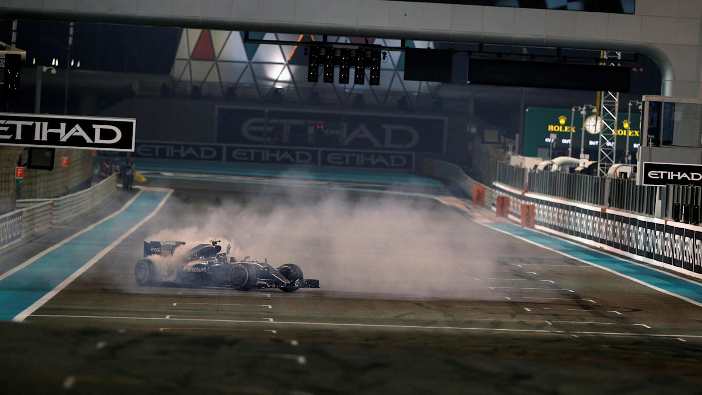 New World Champion Nico Rosberg (GER) Mercedes-Benz F1 W07 Hybrid celebrates at the end of the race with donuts at Formula One World Championship, Rd21, Abu Dhabi Grand Prix, Race, Yas Marina Circuit, Abu Dhabi, UAE, Sunday 27 November 2016. © Sutton Images