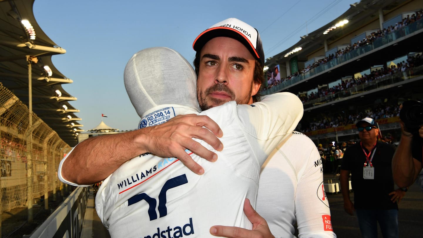 Fernando Alonso (ESP) McLaren and  Felipe Massa (BRA) Williams on the grid at Formula One World Championship, Rd21, Abu Dhabi Grand Prix, Race, Yas Marina Circuit, Abu Dhabi, UAE, Sunday 27 November 2016. © Sutton Images