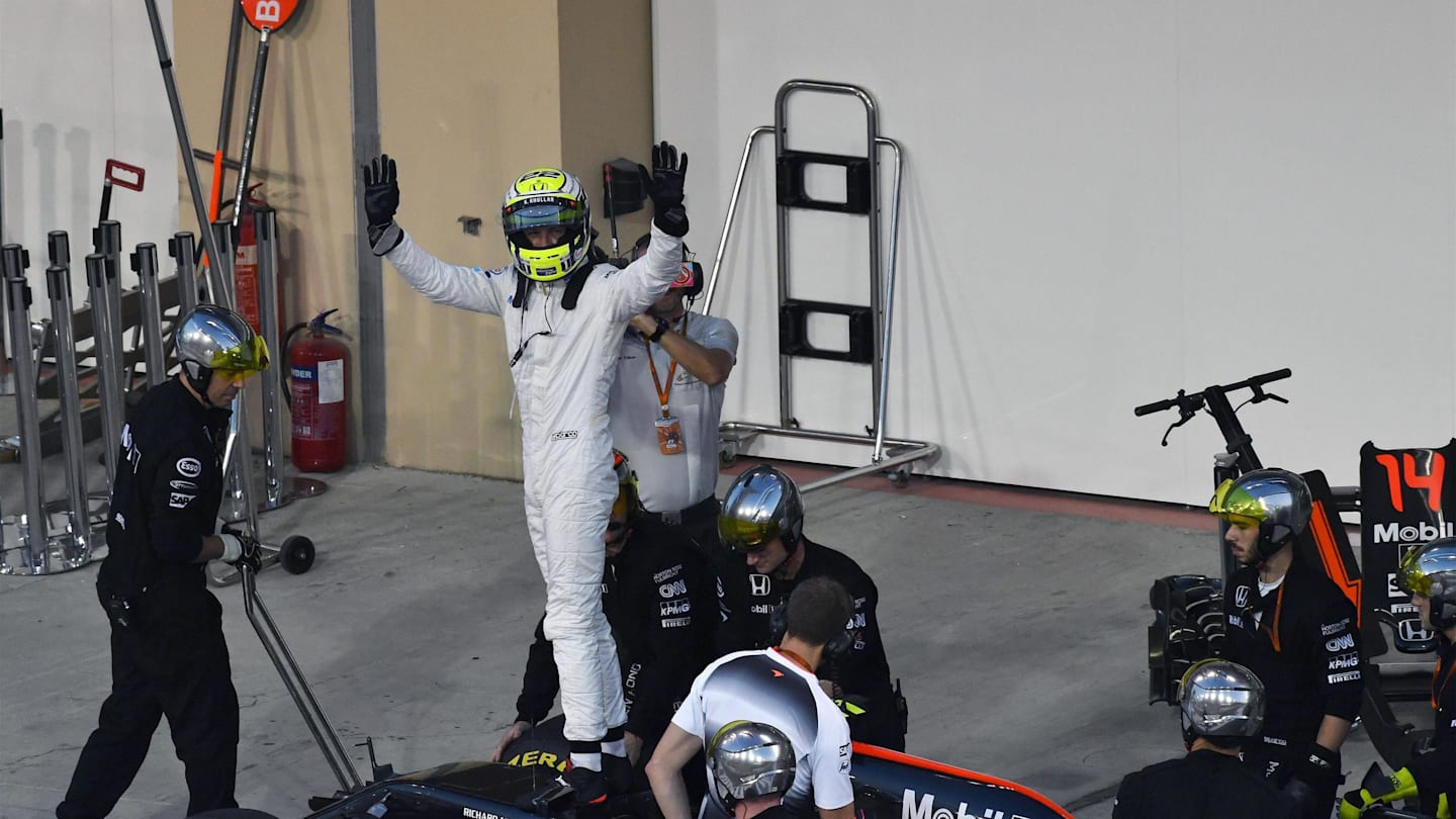 Race retiree Jenson Button (GBR) McLaren MP4-31 at Formula One World Championship, Rd21, Abu Dhabi